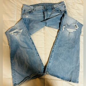 Light wash distressed knee flare American Eagle woman’s jeans